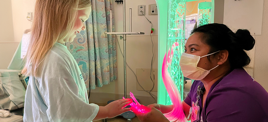 provider and child patient at a children's hospital