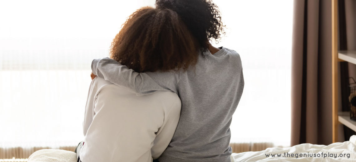 Mom comforting teenage daughter